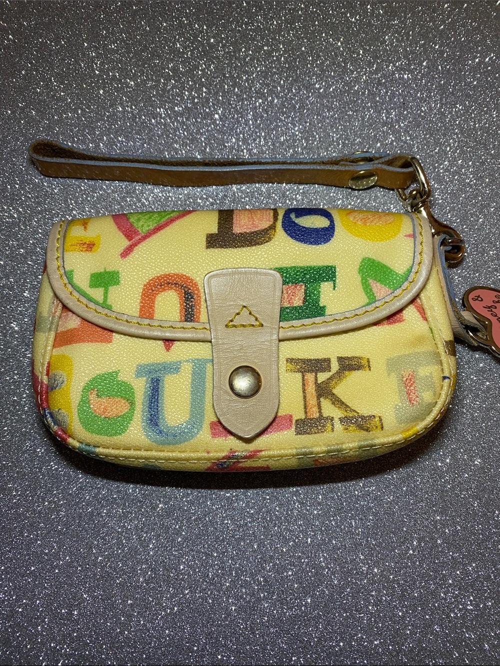 Dooney & Bourke Cream Canvas/Leather Logo Print Pattern Wristlet